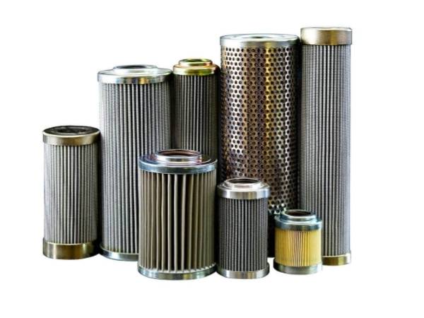 Several different types of hydraulic filter element on white background.